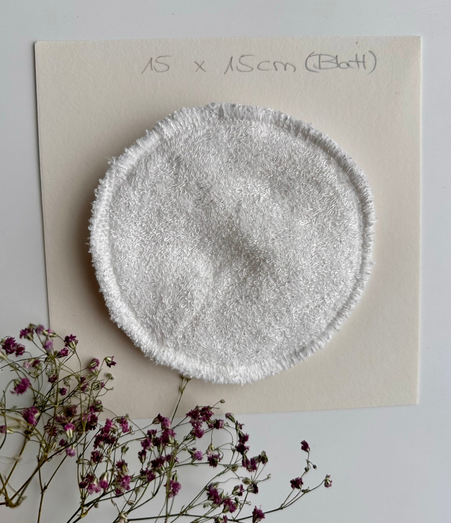 Stilleinlage aus Baumwolle mit Größendarstellung - ca 10 cm x 10 cm.